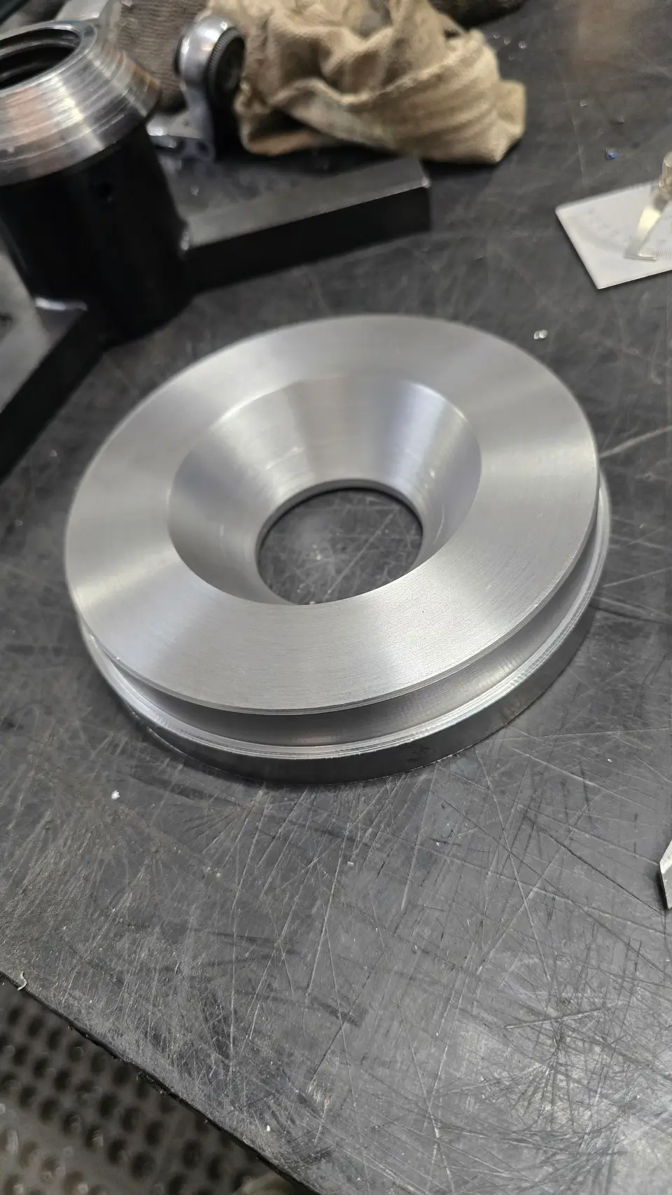 Machined component on the bench