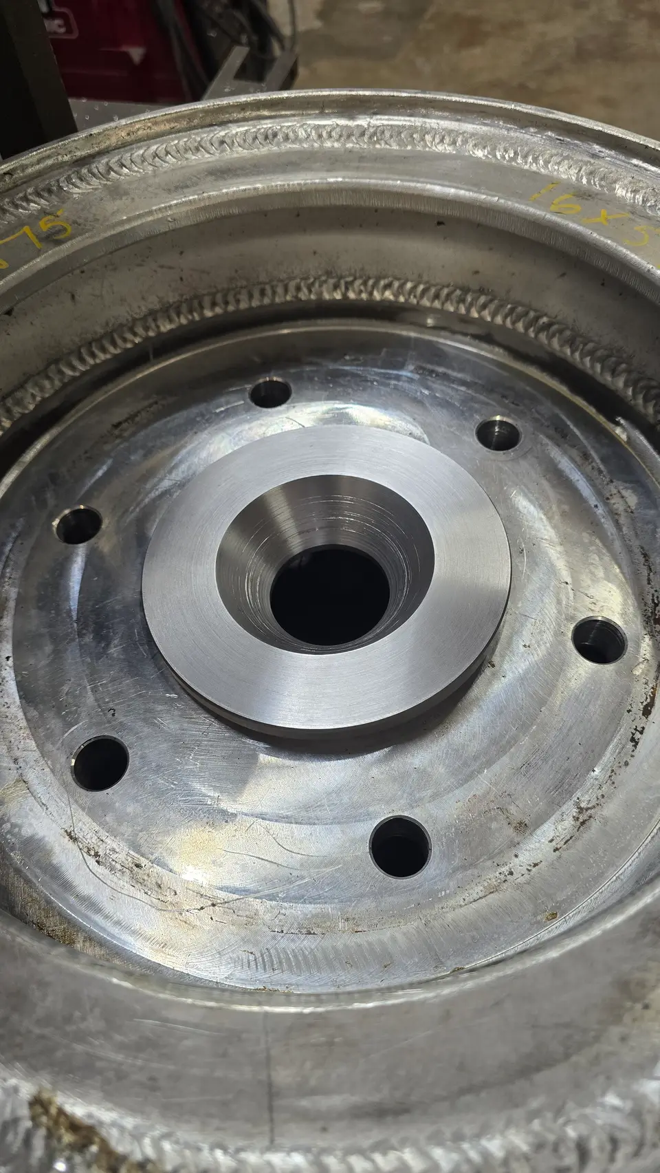 Welded hub assembly with machined faces
