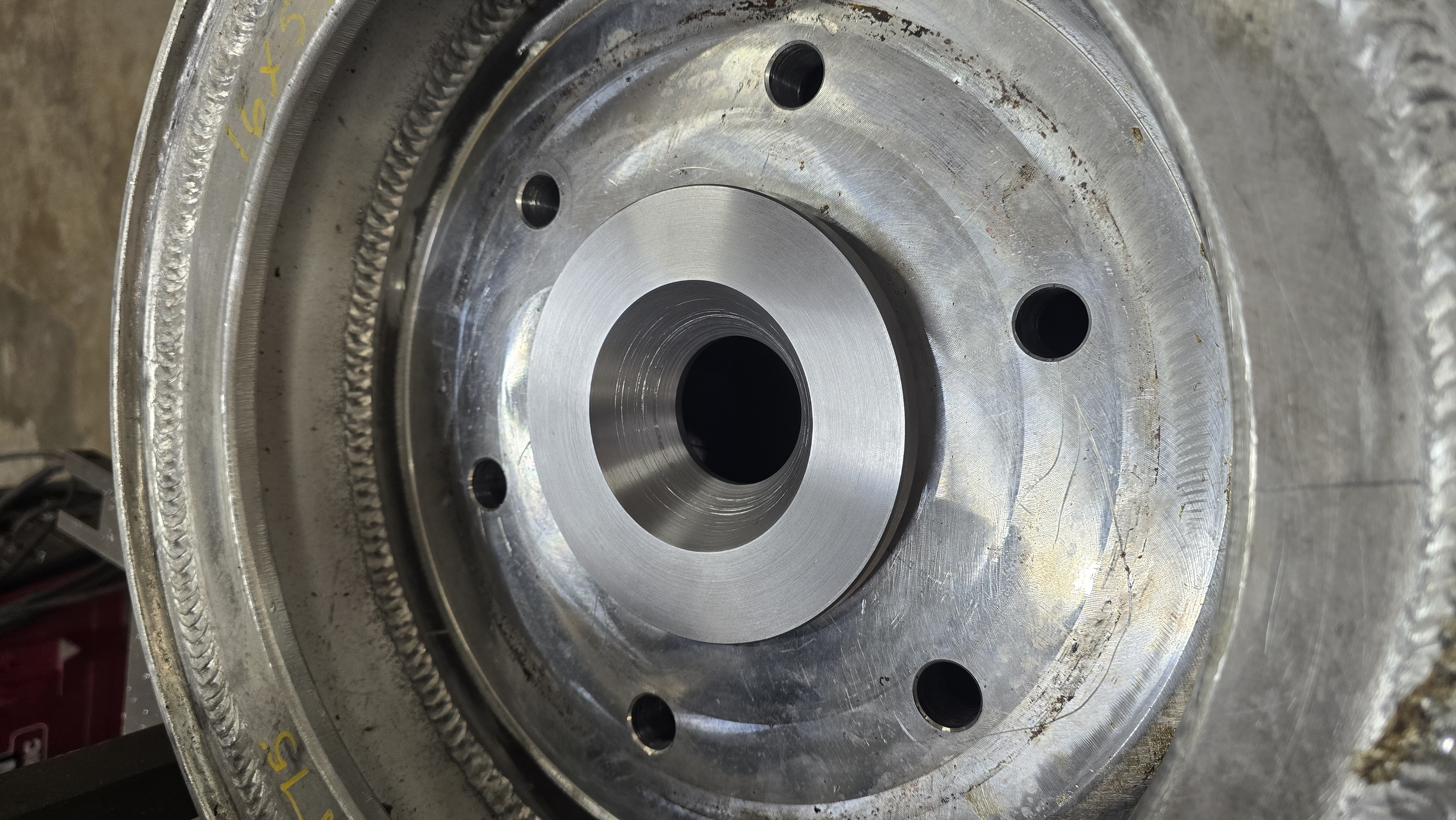 Welded hub assembly with machined faces