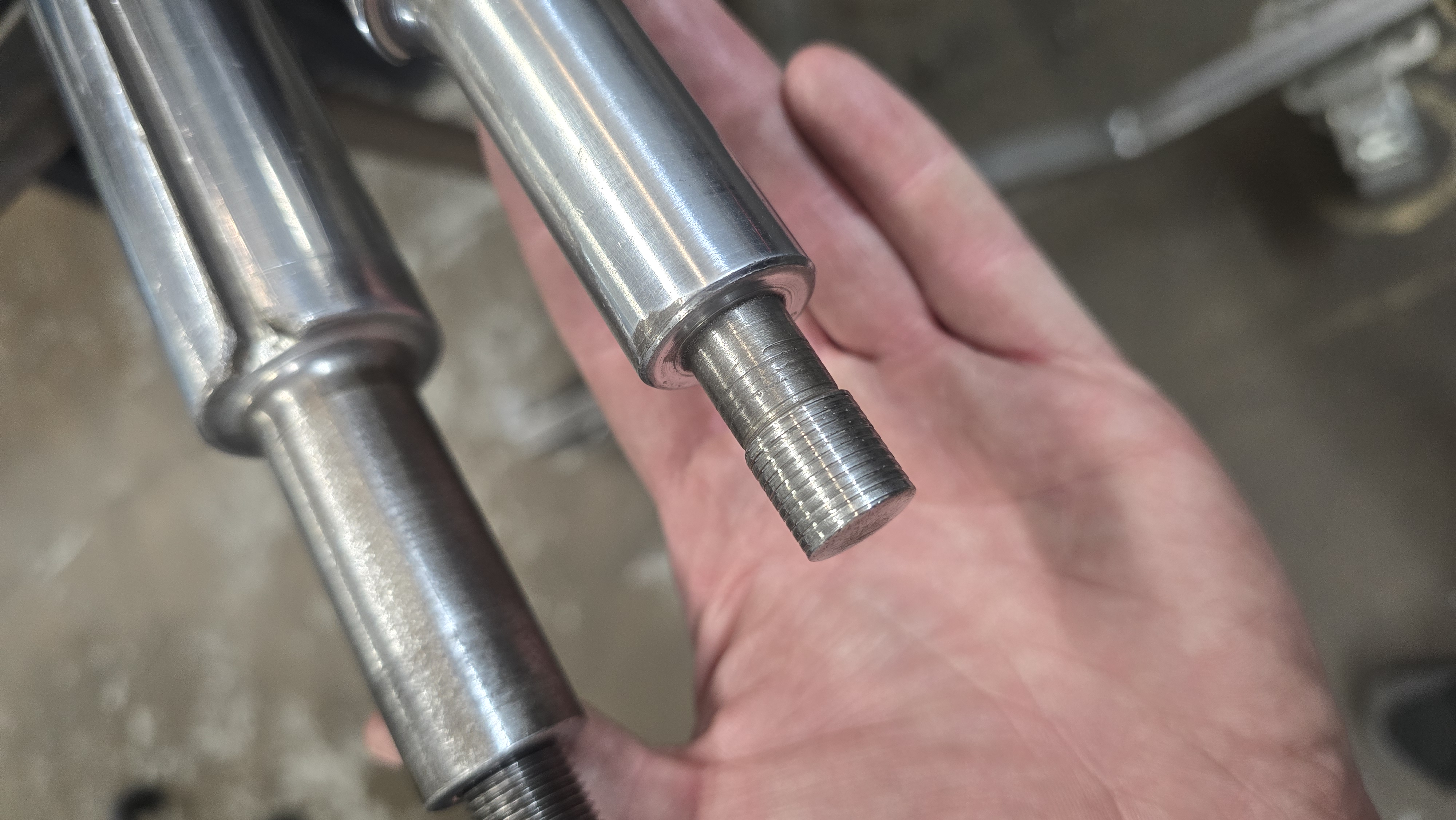 Turned shafts held in hand
