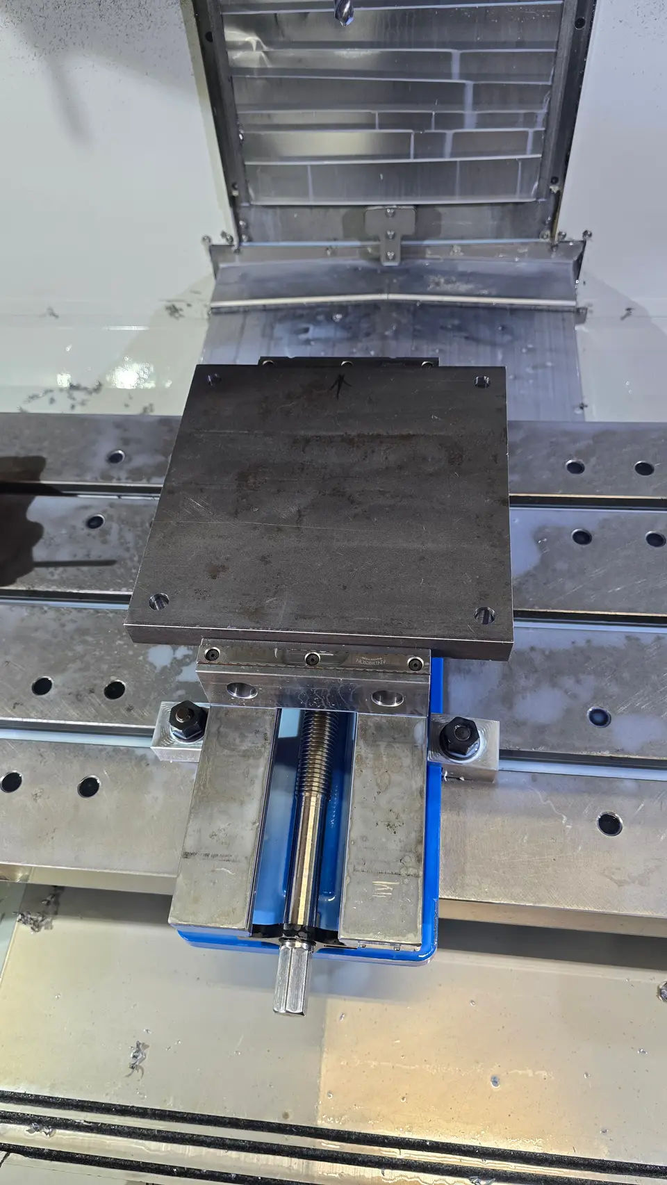 Aluminum stock clamped in the mill vise
