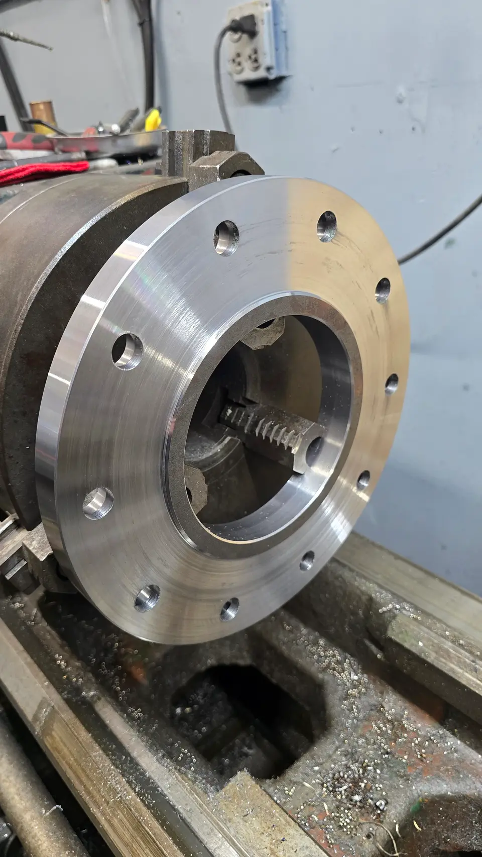 Flange set up with hardware in the mill