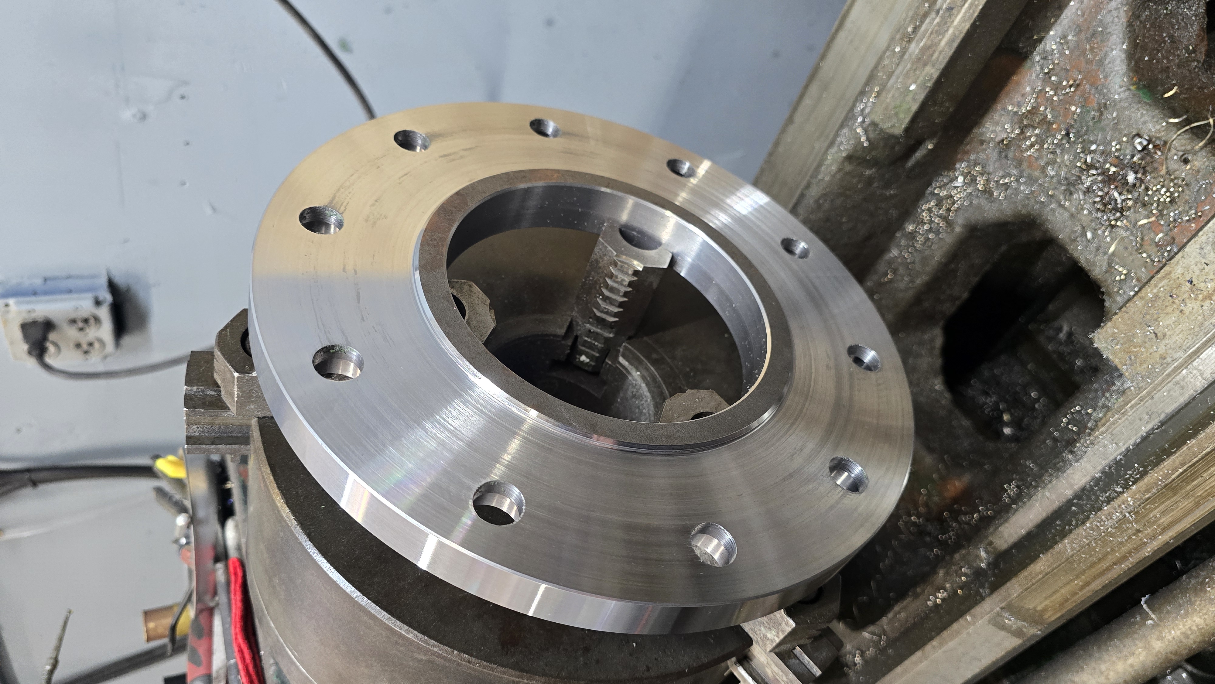 Flange set up with hardware in the mill